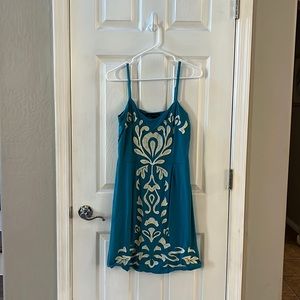 Women’s turquoise shirt dress size large